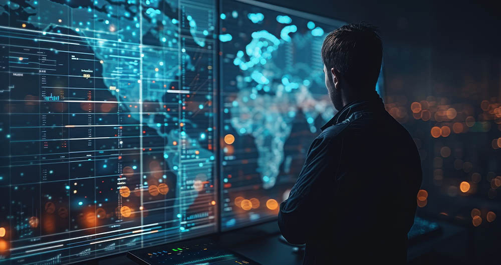 Panel tecnológico con un mapamundi y una persona observándolo