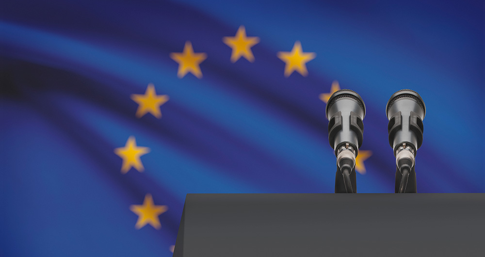 EU flag with microphones