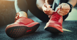 Athlete tying his laces