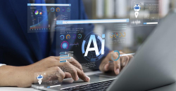 Unas manos tecleando sobre un ordenador dodne se muestras las siglas AI (inteligencia artificial)